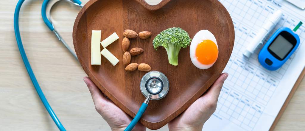 Image that says keto in food on a heart with medical data.